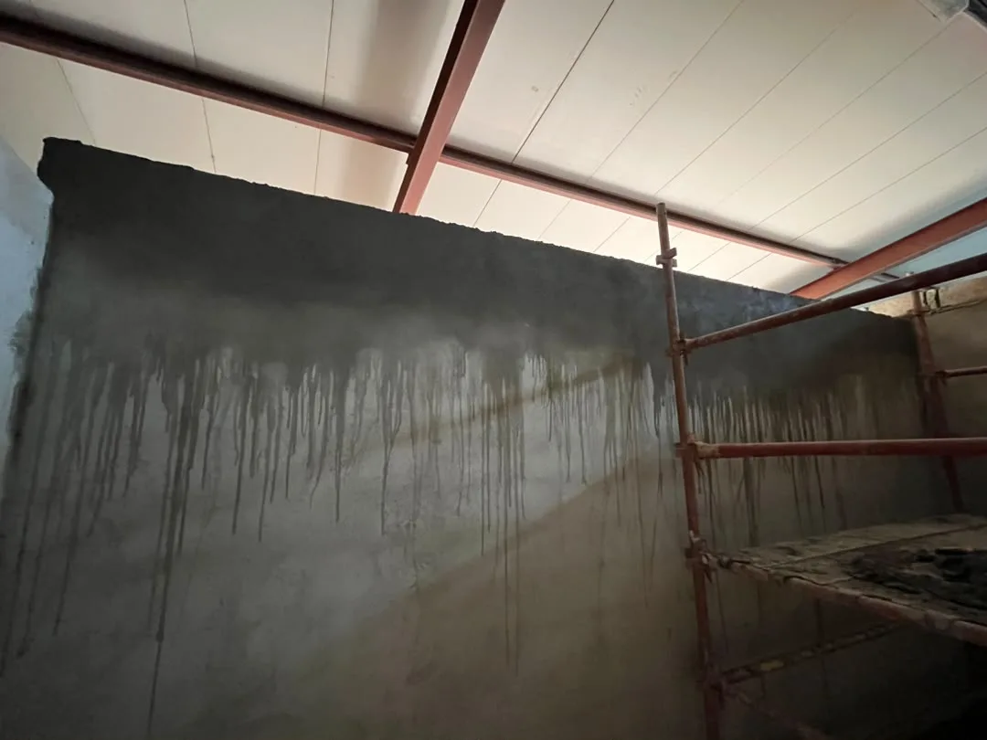 Plastering to a completed blockwork wall